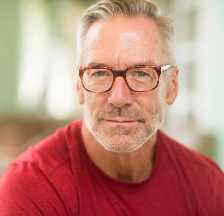 mishawaka man wearing glasses and red shirt