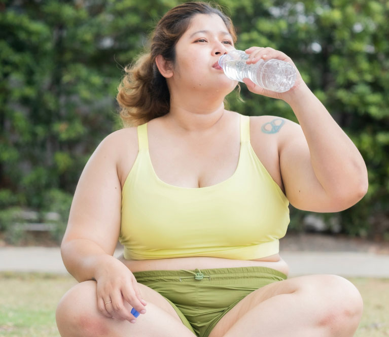mishawaka woman drinking water