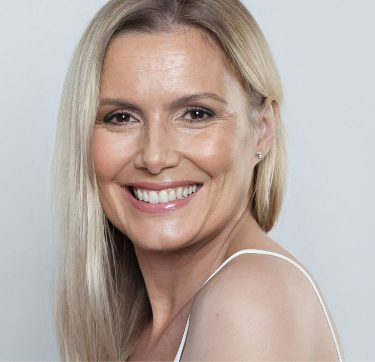 blonde mishawaka facetite model smiling broadly