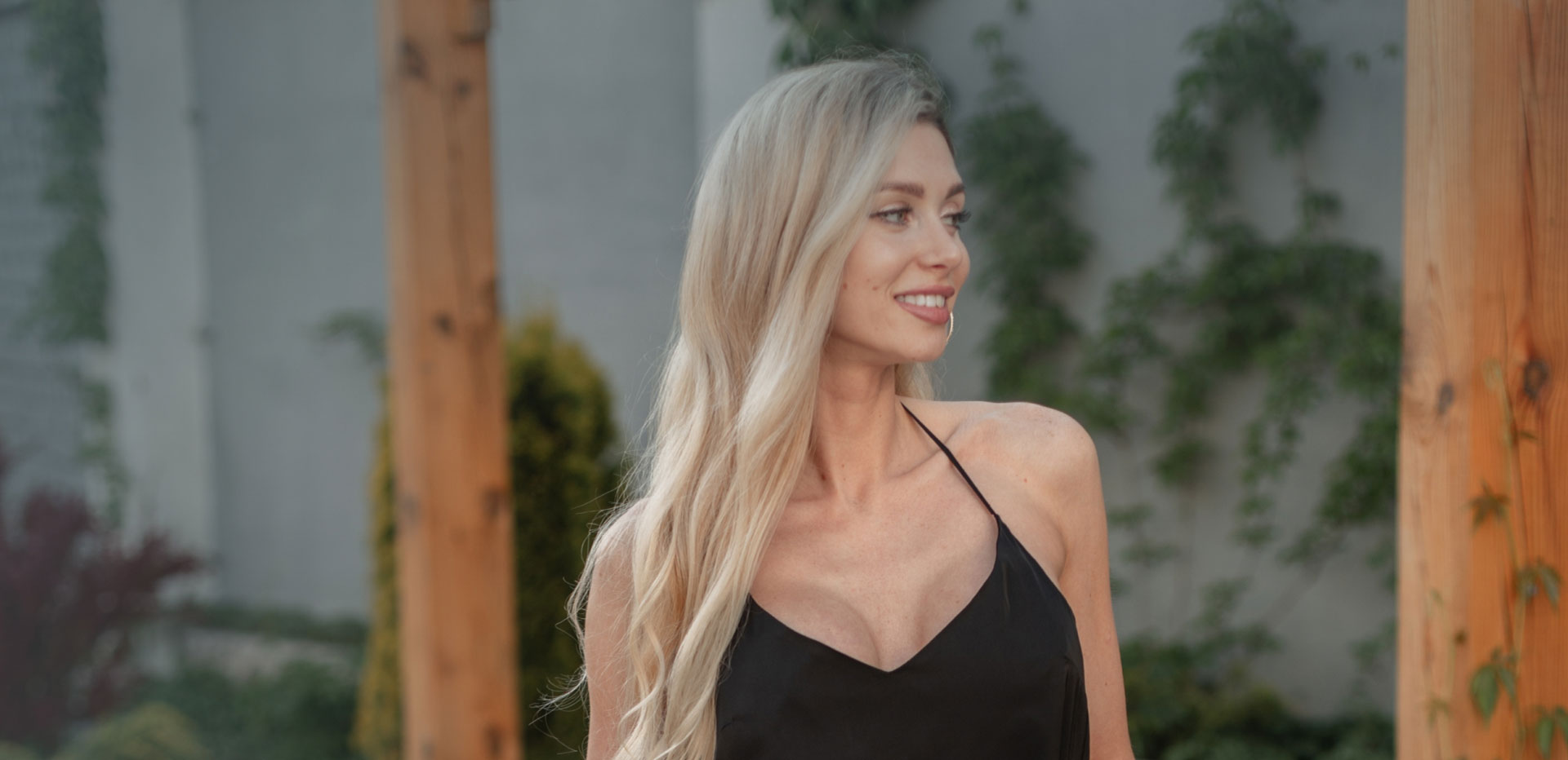 mishawaka breast procedures blonde model in black dress