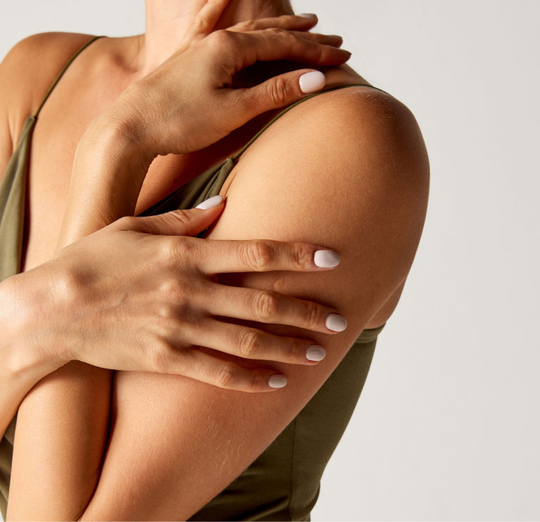 woman holding herself